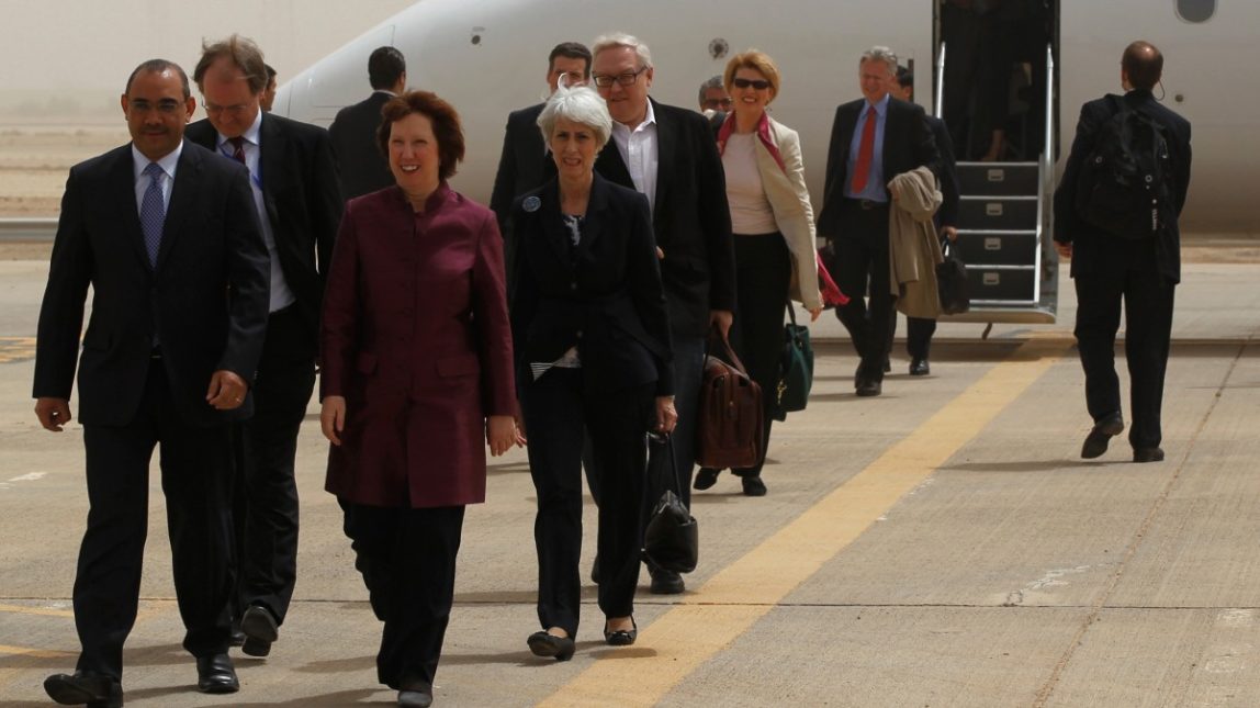 World powers negotiators arrive at the Baghdad International Airport in Iraq, Wednesday, May 23, 2012. Negotiators from the U.S. and five other world powers sat down Wednesday with a team of Iranian diplomats to try to hammer out specific goals in the years-long impasse over Tehran's nuclear program.(AP Photo/Mohammed Ameen, Pool)