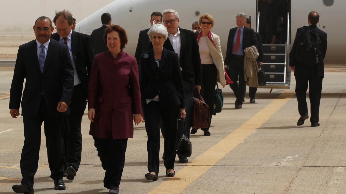 World powers negotiators arrive at the Baghdad International Airport in Iraq, Wednesday, May 23, 2012. Negotiators from the U.S. and five other world powers sat down Wednesday with a team of Iranian diplomats to try to hammer out specific goals in the years-long impasse over Tehran's nuclear program.(AP Photo/Mohammed Ameen, Pool)