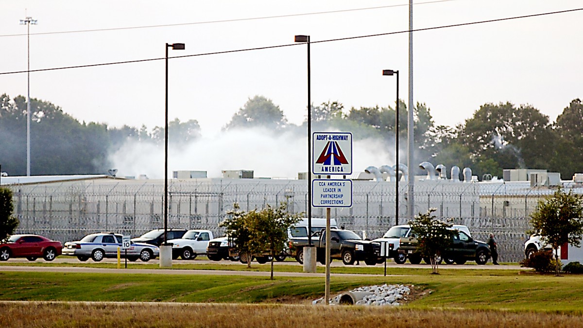 Smoke rises above the Adams County Correctional Center in Natchez, Miss., Sunday, May 20, 201, during an inmate disturbance at the prison. Several prison employees have been sent to local hospitals for treatment. The county coroner said one prison guard is dead. (AP photos/The Natchez Democrat, Lauren Wood)