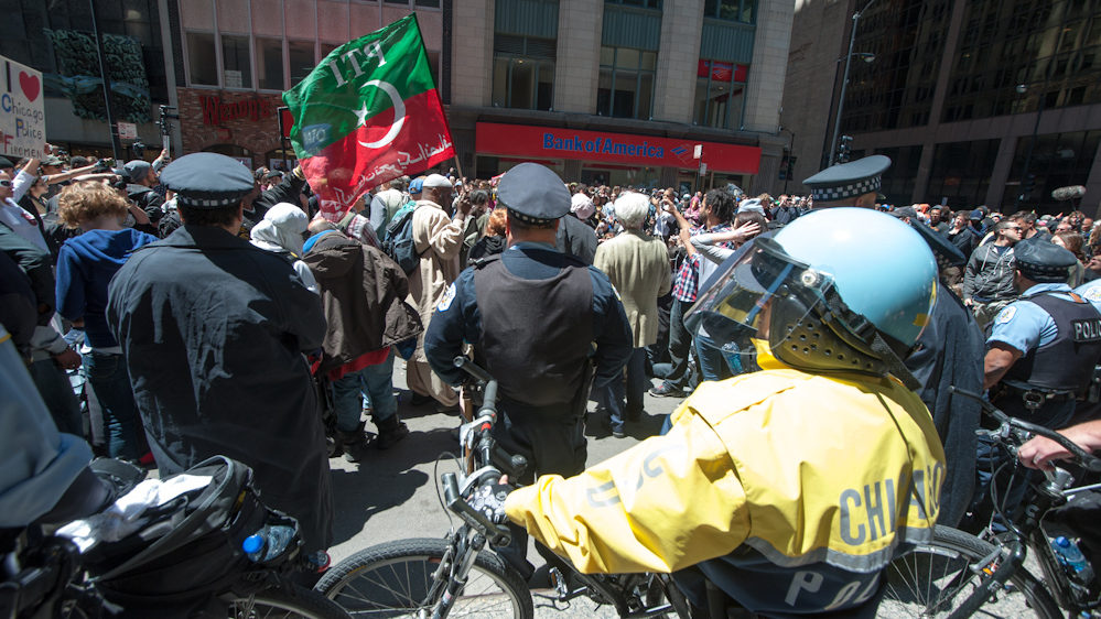 On the second day of the NATO summit thousands of demonstrators stage a peaceful march through Chicago's financial district on Monday May 21, 2012. (Photo Norbert Schiller/Mint Press)