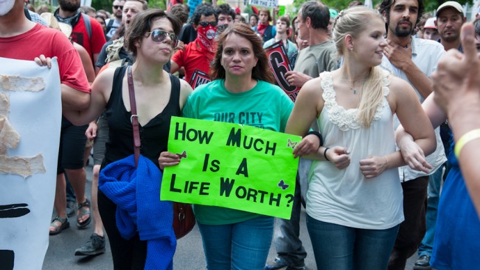 Occupy protesters marched down the streets in Chicago toward Mayor Rahm Emanuel's home. Spending cuts to healthcare services, including mental health care, fueled the demonstration Saturday, May 19, 2012. (Photo Norbert Schiller/Mint Press)