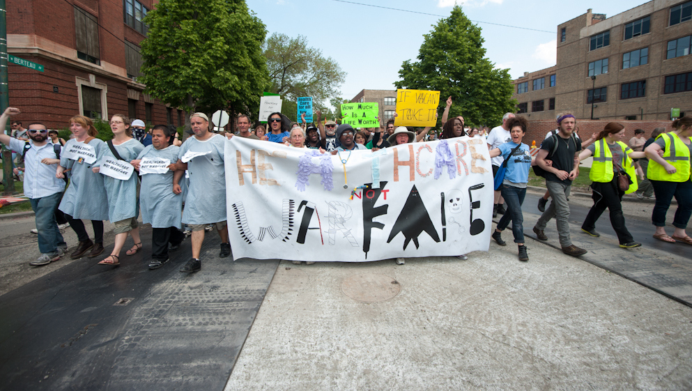 Budget cuts to healthcare services and facilities are protested during a march to Mayor Rahm Emanuel's home in Chicago Saturday, May 19, 2012. (Photo by Norbert Schiller/Mint Press)