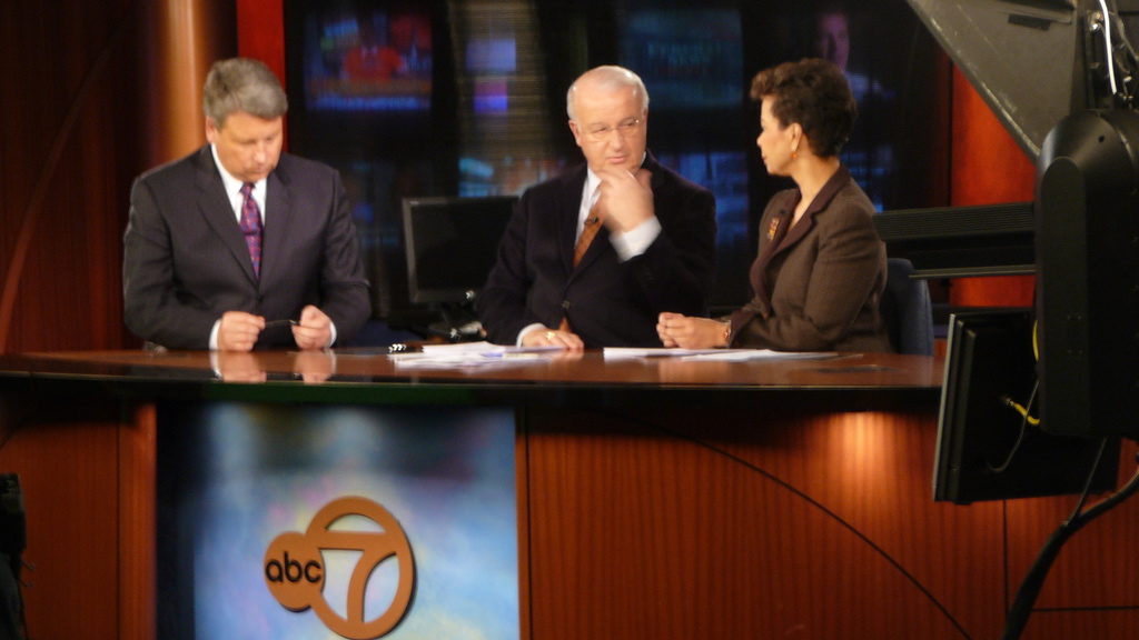 News anchors discuss the news on the air. (Photo by Scott S.)