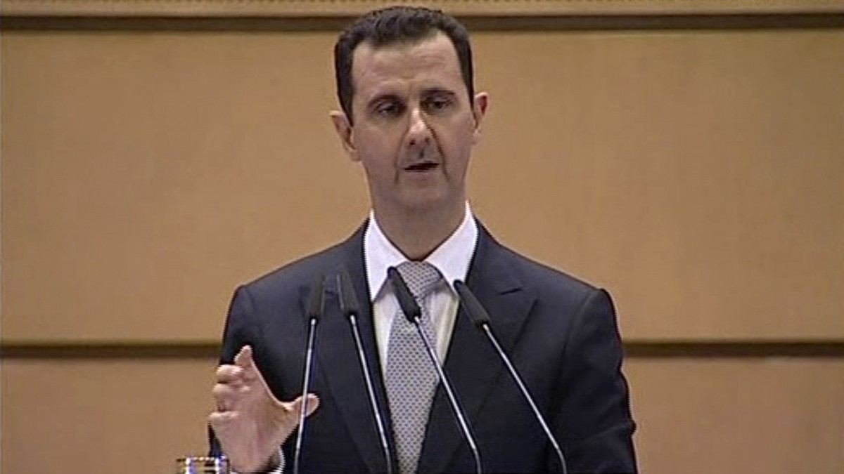 In this image made from video, Syrian President Bashar Assad delivers a speech in Damascus, Syria, Tuesday, Jan. 10, 2012. (AP Photo/Syrian State Television via APTN)