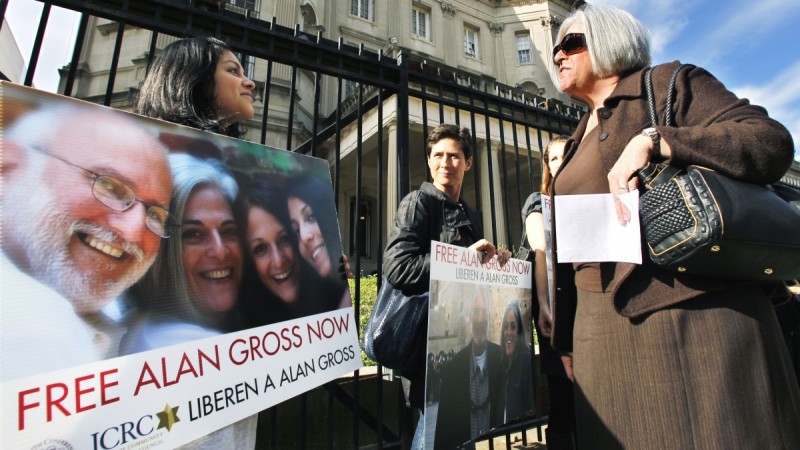 Judy Gross, wife of Alan Gross, an American imprisoned in Cuba, right, talks to Nirma Medrano, left, during a rally to support her husband, Monday, Nov. 28, 2011, outside the Cuban Interests Section in Washington. (AP Photo/Manuel Balce Ceneta)