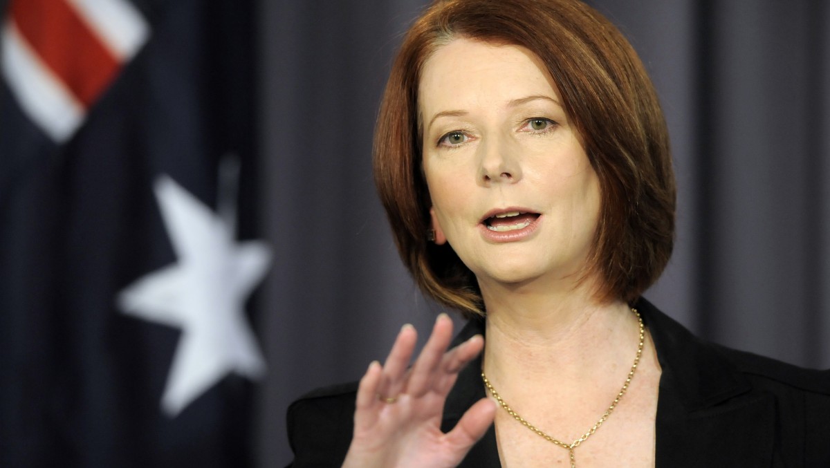 Prime Minister Julia Gillard speaks at the national Press Club before the announcement of the impending Australian general election, Thursday, July 15, 2010. Australia's government is preparing to reveal a spending plan that would make it the first major developed economy to return to a budget surplus after the global financial crisis. (AP Photo/Mark Graham)