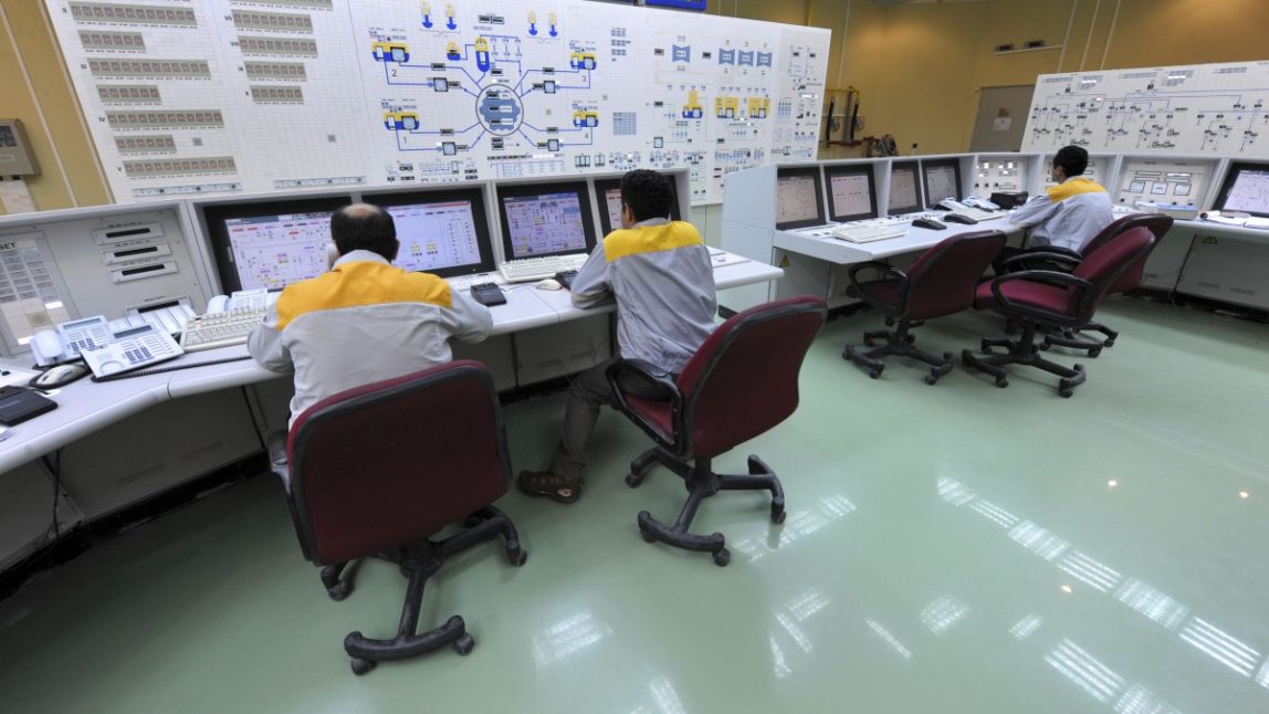In this file photo made Monday, Aug. 23, 2010, and released by the International Iran Photo Agency, Iranian technicians work at the Bushehr nuclear power plant, outside the southern city of Bushehr, Iran. (AP Photo/IIPA,Ebrahim Norouzi, file)
