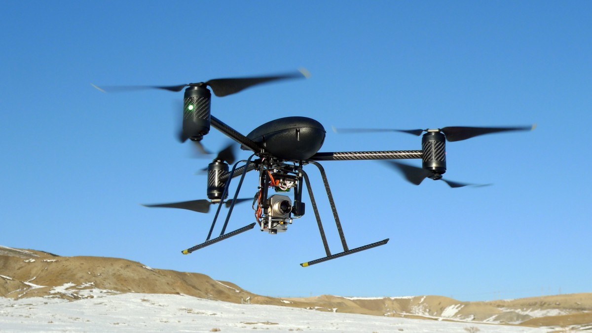 In this Jan. 8, 2009, photo provided by the Mesa County Sheriff's Department, a small Draganflyer X6 drone is photographed during a test flight in Mesa County, Colo., with a Forward Looking Infared payload. (AP Photo/Mesa County Sheriff's Unmanned Operations Team)
