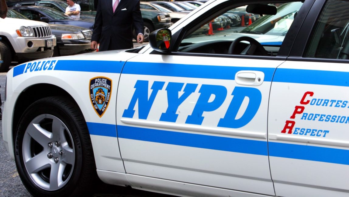 NYPD Commissioner Raymond Kelly poses for photographers next to the new police cruiser, a 2006 Dodge Charger, on display at New York City Police Department's headquarters in New York, Monday, Aug. 14, 2006. (AP Photo/Mary Altaffer)