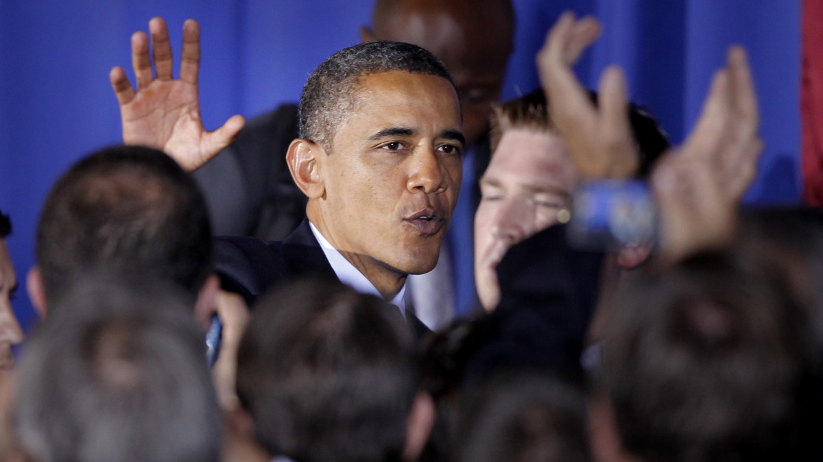 In this Oct. 11, 2011, file photo, President Barack Obama waves as he leaves the International Brotherhood of Electrical Workers Local No. 5 Training Center after speaking about jobs in Pittsburgh. (AP Photo/Keith Srakocic, File)