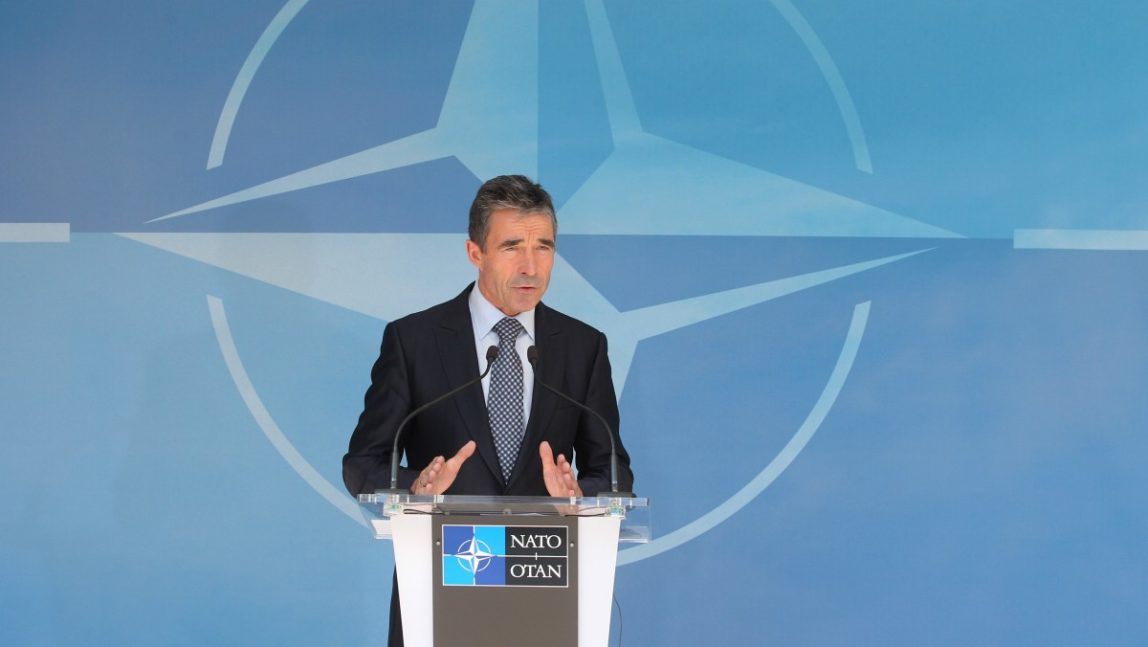 NATO Secretary General Anders Fogh Rasmussen addresses the media after he met with NATO ambassadors at NATO headquarters in Brussels, Tuesday, June 26, 2012. (AP Photo/Yves Logghe)