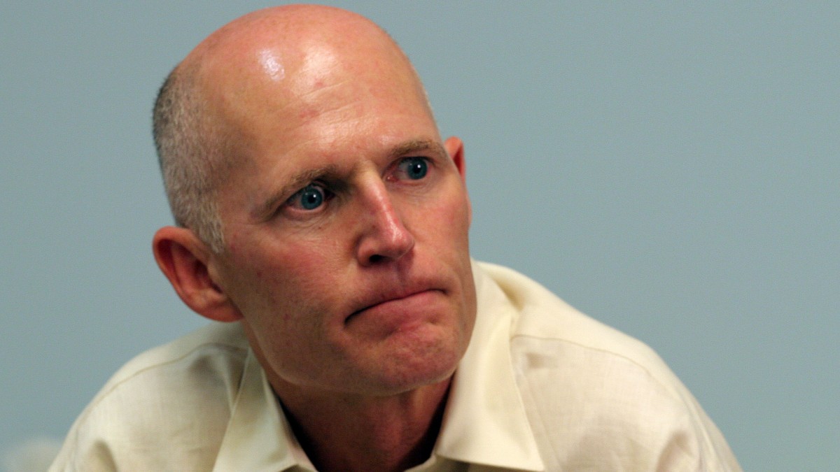 Florida Gov. Rick Scott speaks with reporters of the Associated Press in Miami, Fla. Friday Aug. 19, 2011. (AP Photo/Marta Lavandier)