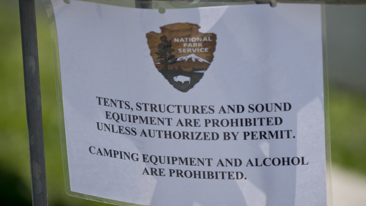 A sign lets activists at the Occupy National Gathering know what rules have been set in place for the movement while protesters assemble in Philadelphia. (Mannie Garcia/MintPress)