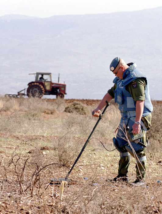 United Nations soldier clearing landmines left by the Israelis in Southern Lebanon. (Photo Norbert Schiller)