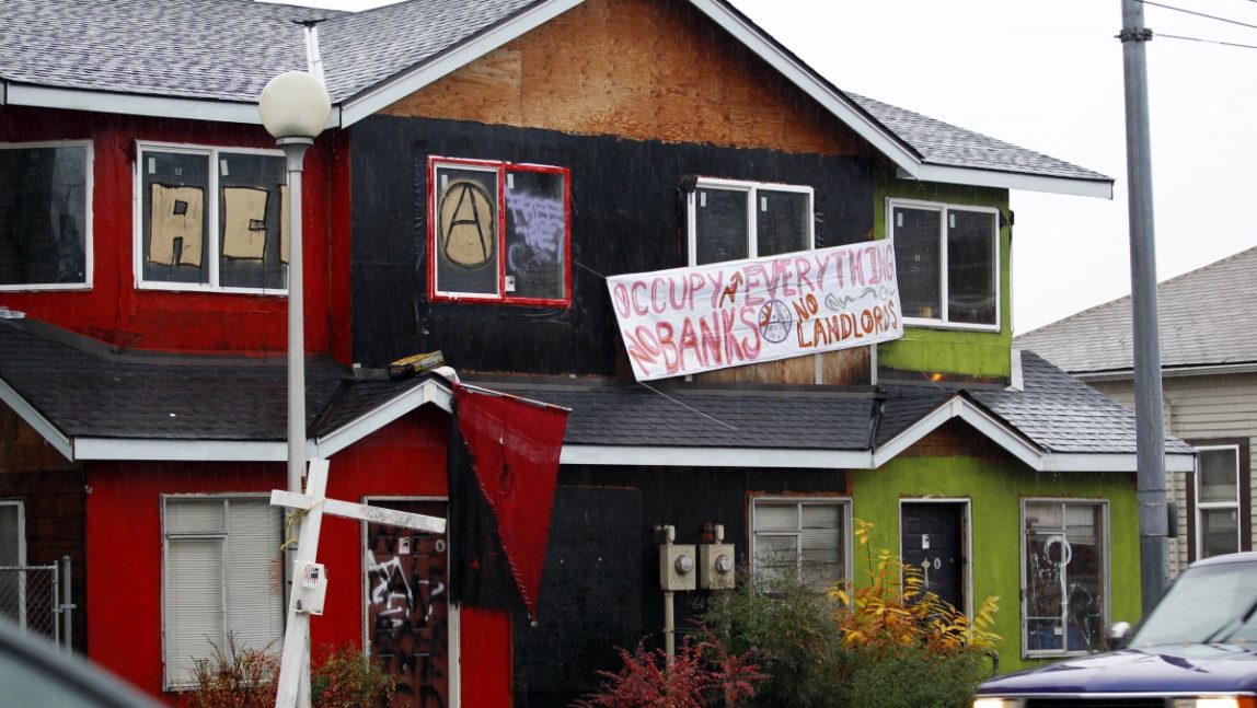 To protest foreclosures in the nation's housing market, Occupy Homes demonstrators in Minneapolis, Minn. have helped homeowners remain in their homes after foreclosure. (AP Photo/Elaine Thompson)