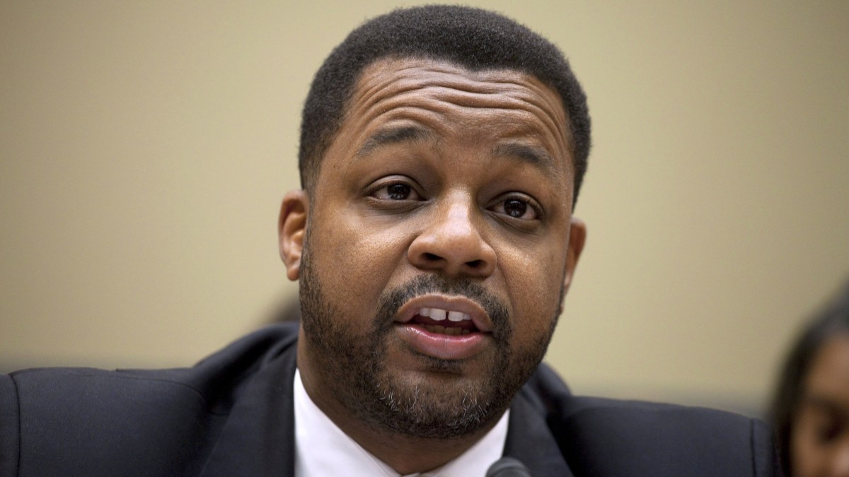 In this May 12, 2011 file photo, Washington D.C. City Council Chairman Kwame Brown testifies on Capitol Hill in Washington. Brown was charged Wednesday with lying about his income on loan applications, becoming the second person on the panel in the last six months to face accusations of criminal wrongdoing. (AP Photo/Harry Hamburg, File)