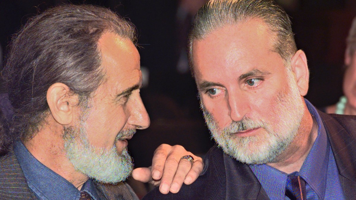 Former New York city police officer and legendary whistleblower Frank Serpico, left, and the Rev. Joseph Tromboli, formerly a police officer in the Internal Affairs Department, share their thoughts before a New York City Council hearing on police corruption and brutality in New York. (AP Photo/Kathy Willens)