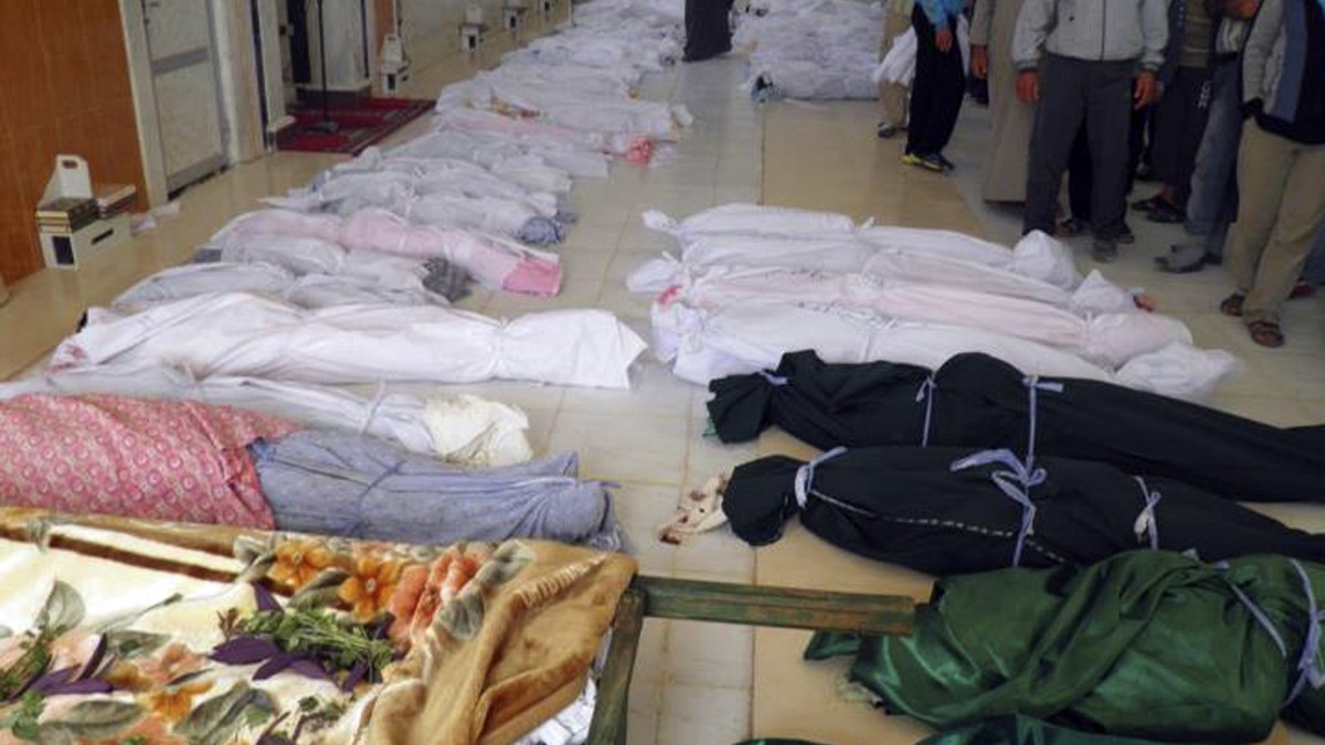 This citizen journalism image provided by Shaam News Network taken Saturday, May 26, 2012 purports to show shrouded dead bodies following a Syrian government assault on Houla, Syria. The Syrian government denied Sunday its troops were behind an attack on a string of villages that left more than 90 people dead, blaming the killings on "hundreds of heavily-armed gunmen" who also attacked soldiers in the area. Friday's assault on Houla, an area northwest of the central city of Homs, was one of the bloodiest single events in Syria's 15-month-old uprising. The U.N. says 32 children under 10 were among the dead. (AP Photo)