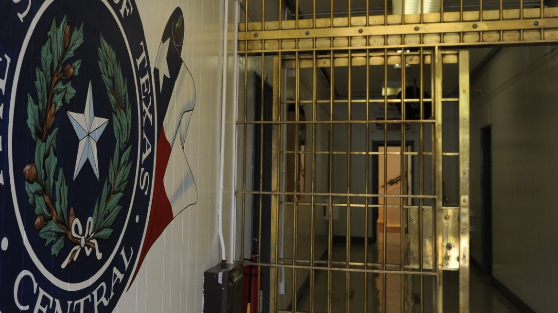 The Texas Department of Criminal Justice Central Unit seal is painted on the wall at the entrance to the cell block Thursday, Aug. 11, 2011, in Sugar Land, Texas. (AP Photo/Pat Sullivan)
