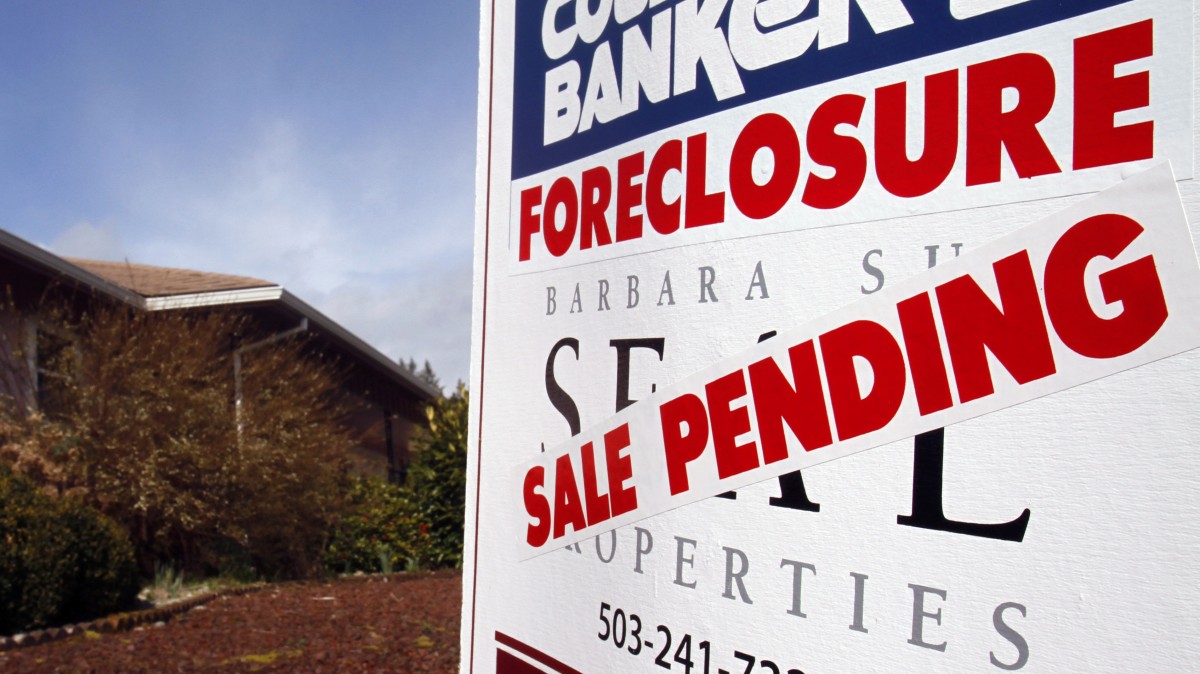 A foreclosed house with sale pending sign is shown in Tigard, Ore., Tuesday, March, 8, 2011. (AP Photo/Don Ryan)