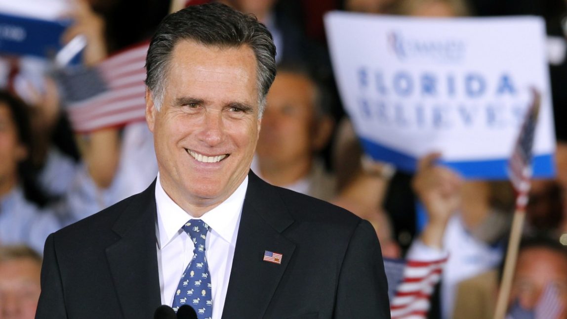 In this Jan. 31, 2012 file photo, Republican presidential candidate, former Massachusetts Gov. Mitt Romney celebrates after winning the Florida primary election, in Tampa, Fla. (AP Photo/Gerald Herbert, File)
