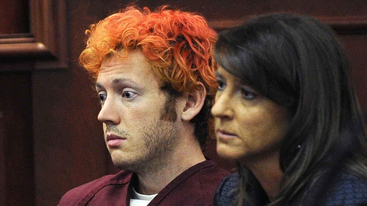 In this Monday, July 23, 2012 file photo, James Holmes, accused of killing 12 people in Friday's shooting rampage in an Aurora, Colo., movie theater, appears in Arapahoe County District Court with defense attorney Tamara Brady in Centennial, Colo. (AP Photo/Denver Post, RJ Sangosti, Pool, File)