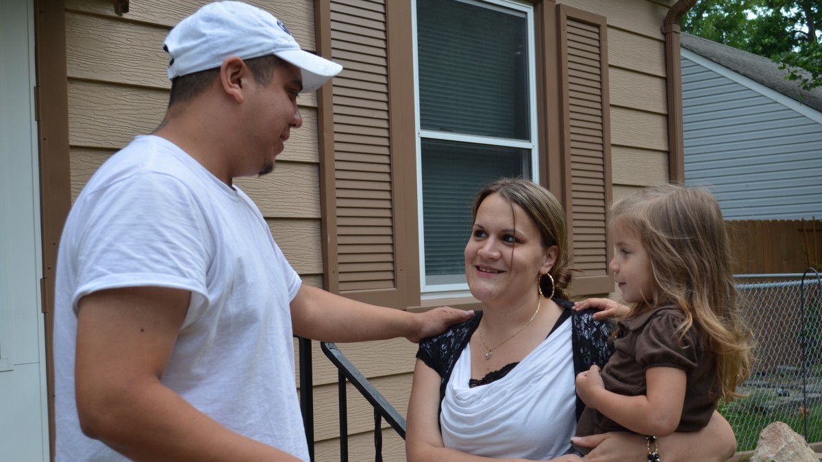 Carlos and Katie Garcia, along with 3 year old Mariana, celebrate a life united after being separated through Carlos' immigration process. Carlos was an illegal immigrant when he met Katie in Austin, Minn. Today, he has legal status. (Trisha Marczak/MintPress)