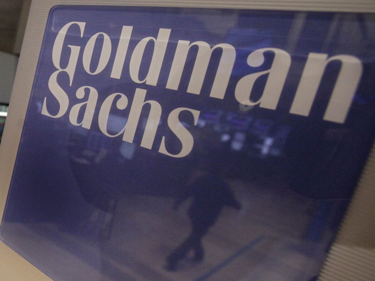 Traders work in the Goldman Sachs booth on the floor of the New York Stock Exchange Thursday, March 15, 2012. (AP Photo/Richard Drew)