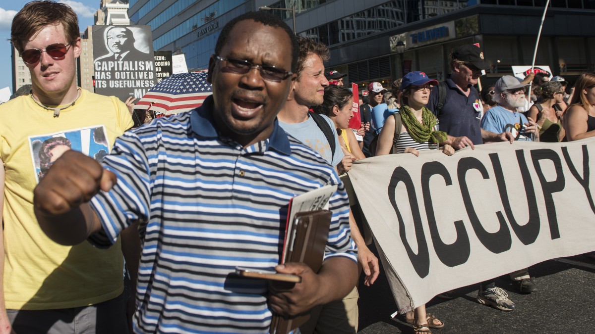 Protesters march through Philadelphia as part of the Occupy National Gathering July, 2, 2012. (Mannie Garcia/MintPress)