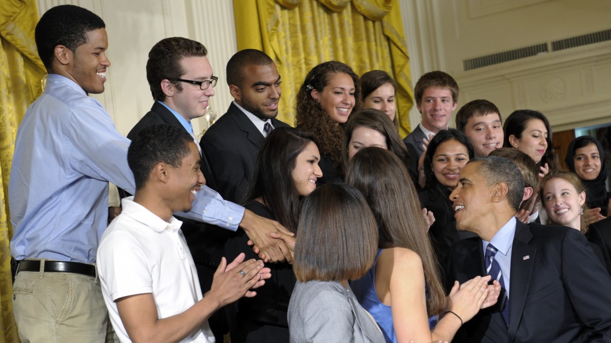 President Barack Obama greets students after he called on Congress to stop interest rates on student loans from doubling. (AP Photo/Susan Walsh)
