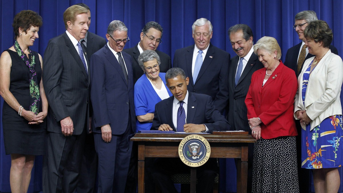 In a May 30, 2012, file photo President Barack Obama signs the reauthorization of the Export-Import Bank Act of 2012, at the Eisenhower Executive Office Building in Washington. (AP Photo/Pablo Martinez Monsivais, File)