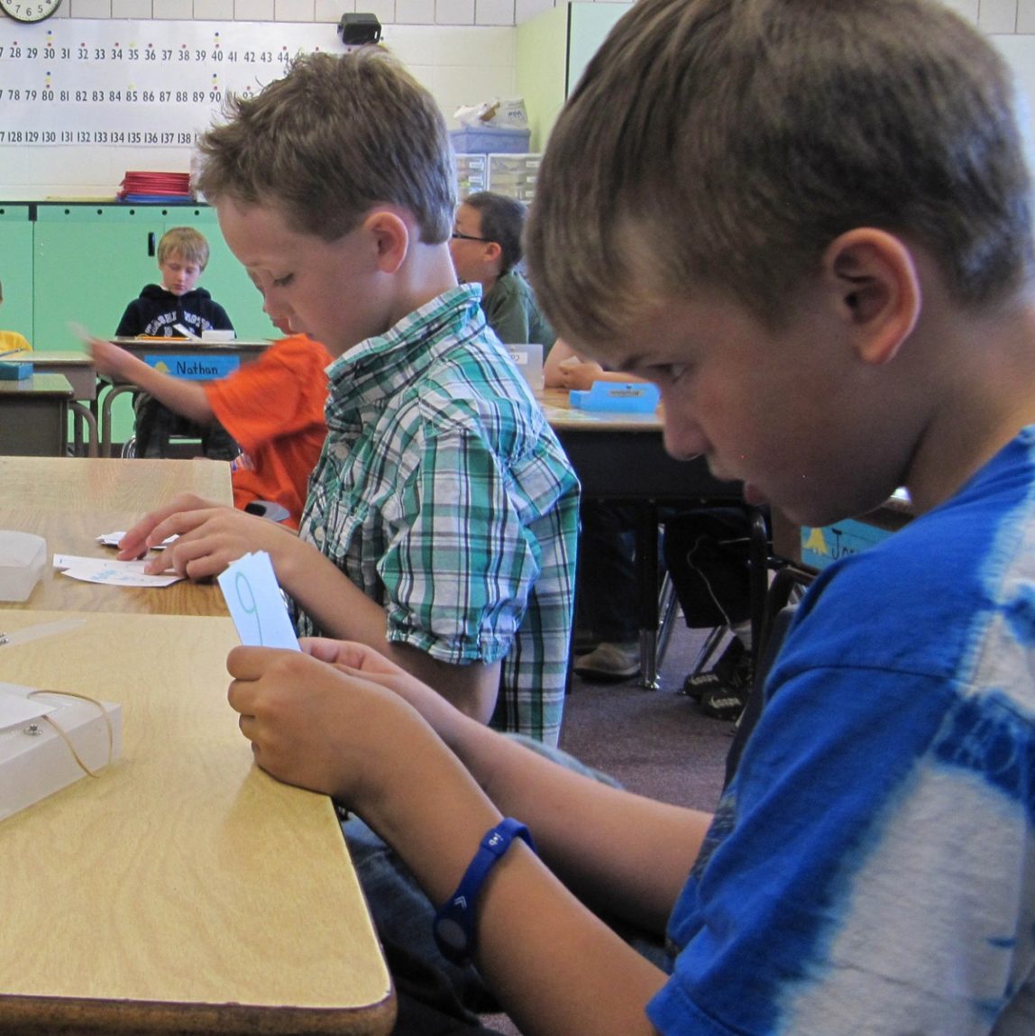 In this photo taken May 9, 2012, students work in a classroom. (AP Photo/Jessie L. Bonner).