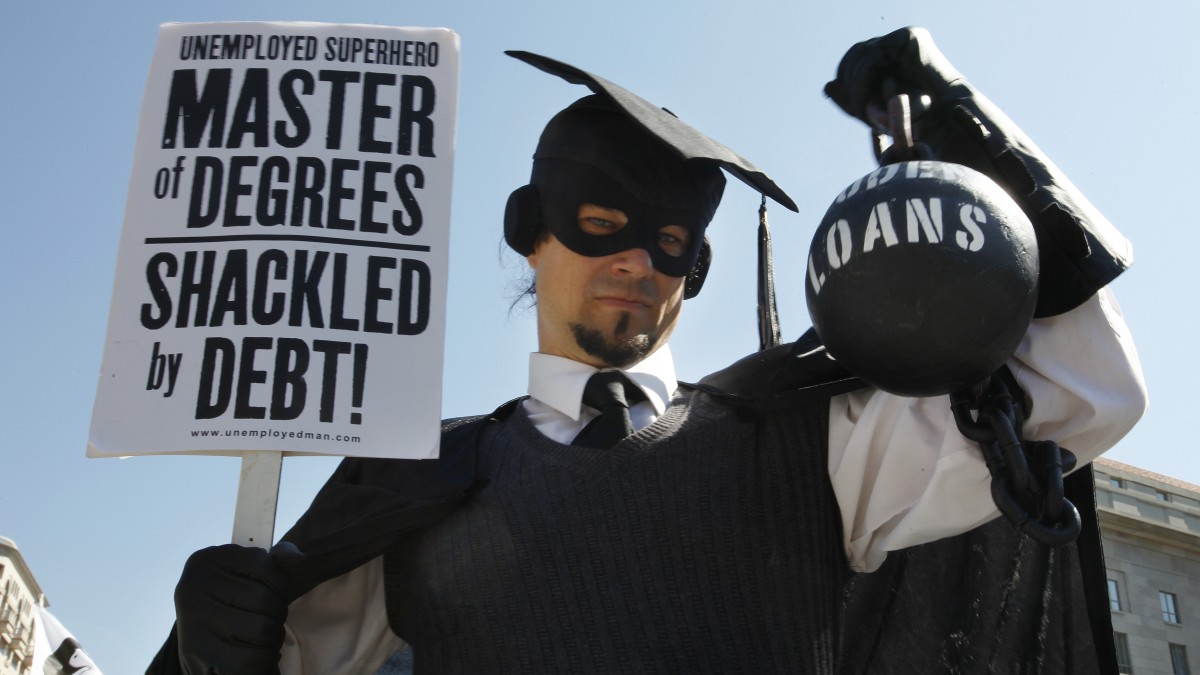 Several groups including the Peoples Uprisings, October2011 Coalition, and Occupy DC, "occupy" Freedom Plaza in Arlington, on Thursday, Oct. 6, 2011. The groups held signs against war and "corporate greed." (AP Photo/Jacquelyn Martin)