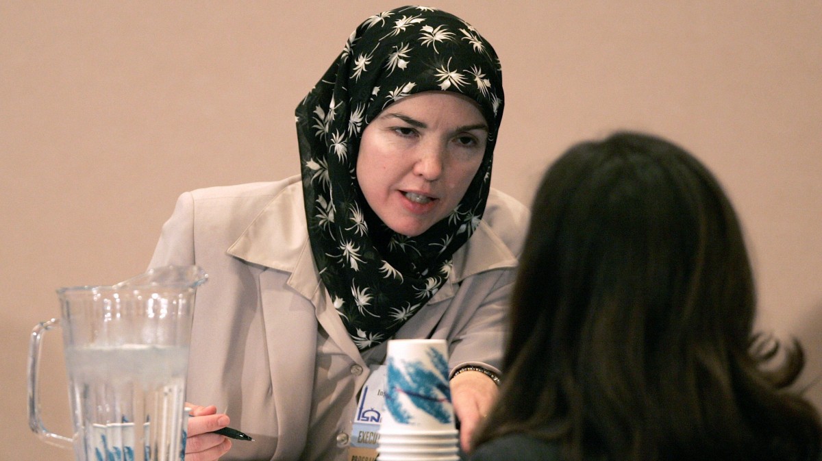 Ingrid Mattson speaks to a colleague before a news conference prior to the inaugural session of the Islamic Society of North America's annual convention, in a photo from Friday, Sept. 2, 2005, in Rosemont, Ill. (AP Photo/Brian Kersey, File)