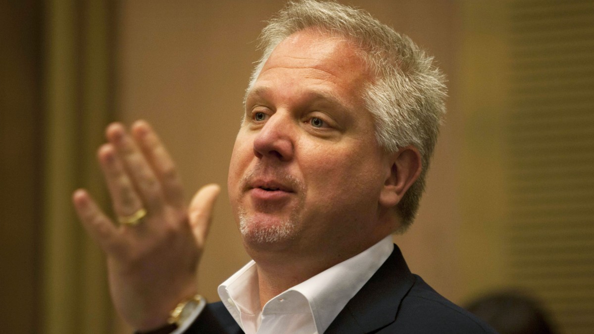 U.S. TV commentator Glenn Beck gestures as he speaks in the Knesset, Israel's parliament, in Jerusalem, Monday, July 11, 2011. (AP Photo/Sebastian Scheiner)