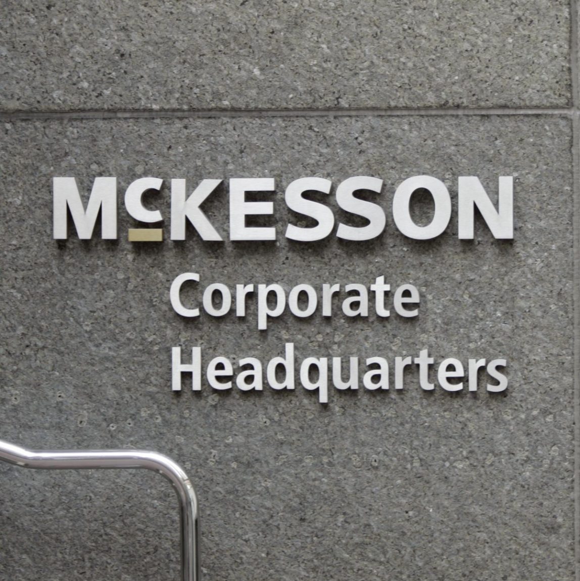 A woman walks into McKesson Corp. headquarters in San Francisco, Thursday, Jan. 31, 2008. (AP Photo/Paul Sakuma)