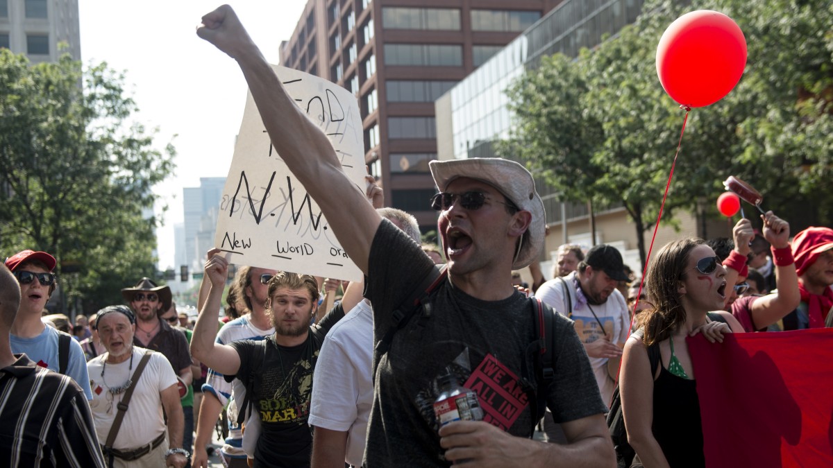 Occupy activists march through the streets of Philadelphia, PA July, 1, 2012. (Mannie Garcia/MintPress)