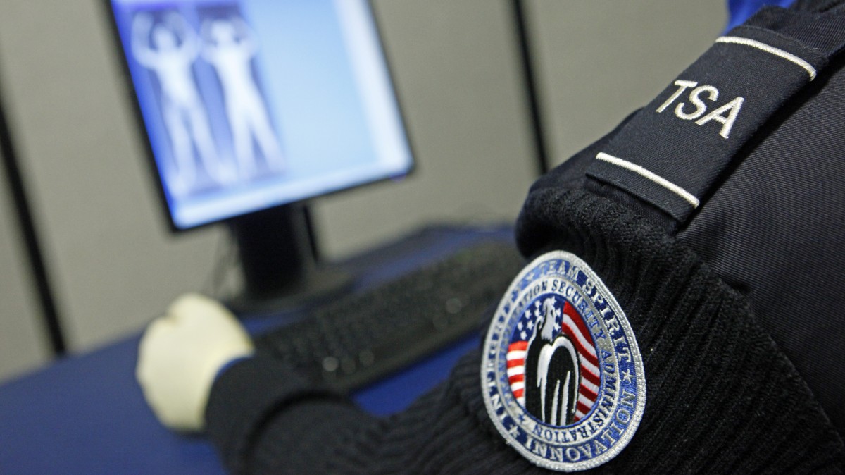 A Transportation Security Administration officer views a full-body scan during a demonstration of passenger screening technology at the TSA Systems Integration Facility in Arlington, Va. (AP Photo/Haraz N. Ghanbari)