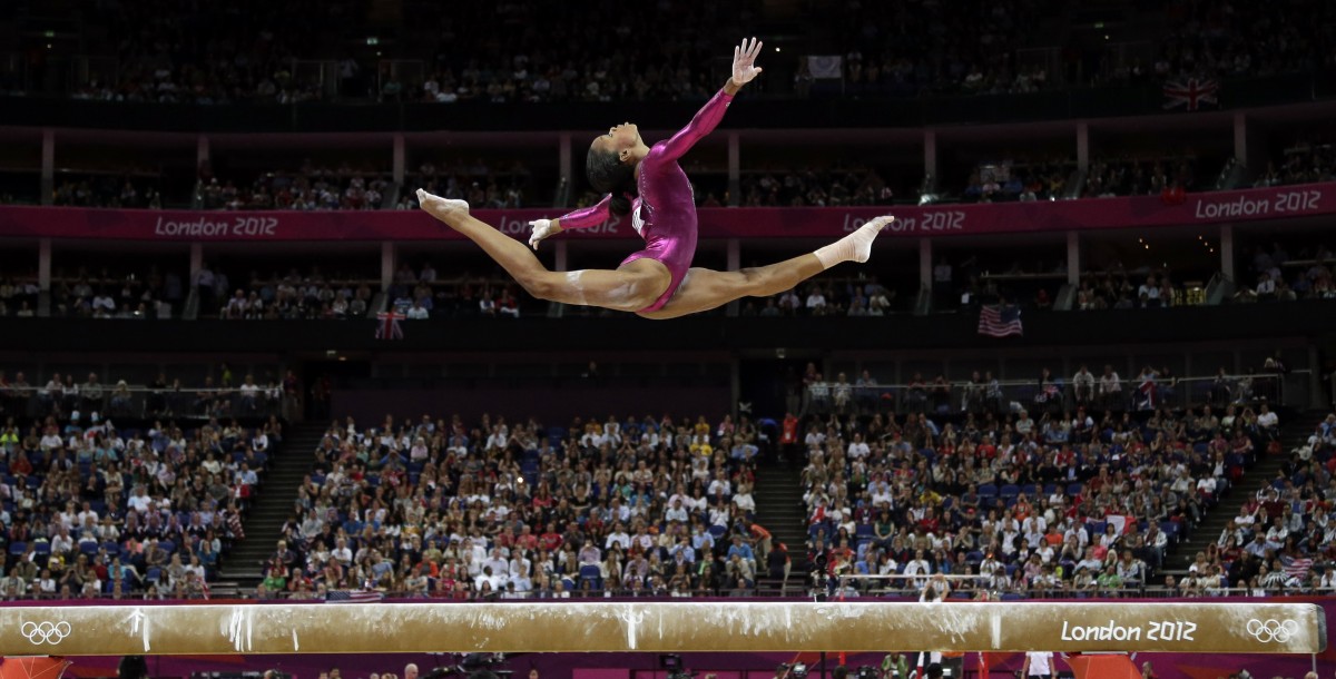 U.S. gymnast Gabrielle Douglas during the artistic gymnastics women's individual all-around competition at the 2012 Summer Olympics, Thursday, Aug. 2, 2012, in London. (AP Photo/Gregory Bull)