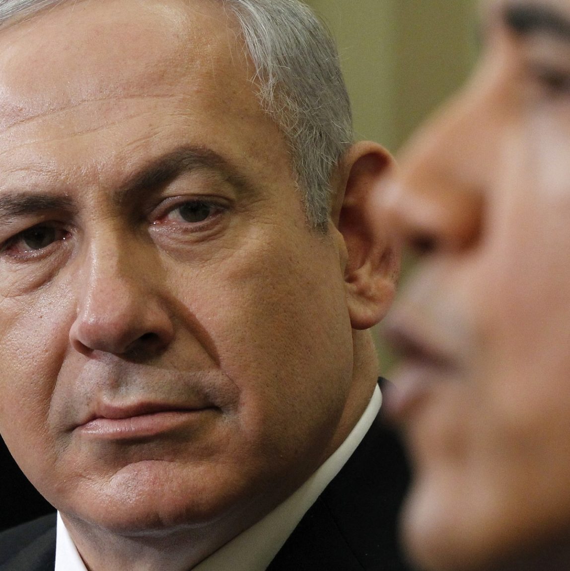 Israeli Prime Minister Benjamin Netanyahu listens as President Barack Obama speaks during their meeting, Monday, March, 5, 2012, in the Oval Office of the White House in Washington. (AP Photo/Pablo Martinez Monsivais)