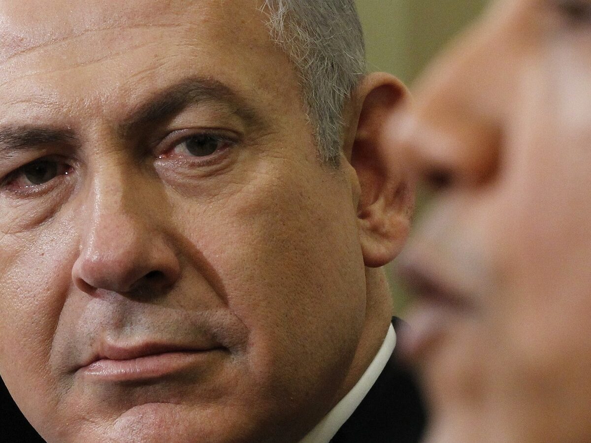 Israeli Prime Minister Benjamin Netanyahu listens as President Barack Obama speaks during their meeting, Monday, March, 5, 2012, in the Oval Office of the White House in Washington. (AP Photo/Pablo Martinez Monsivais)