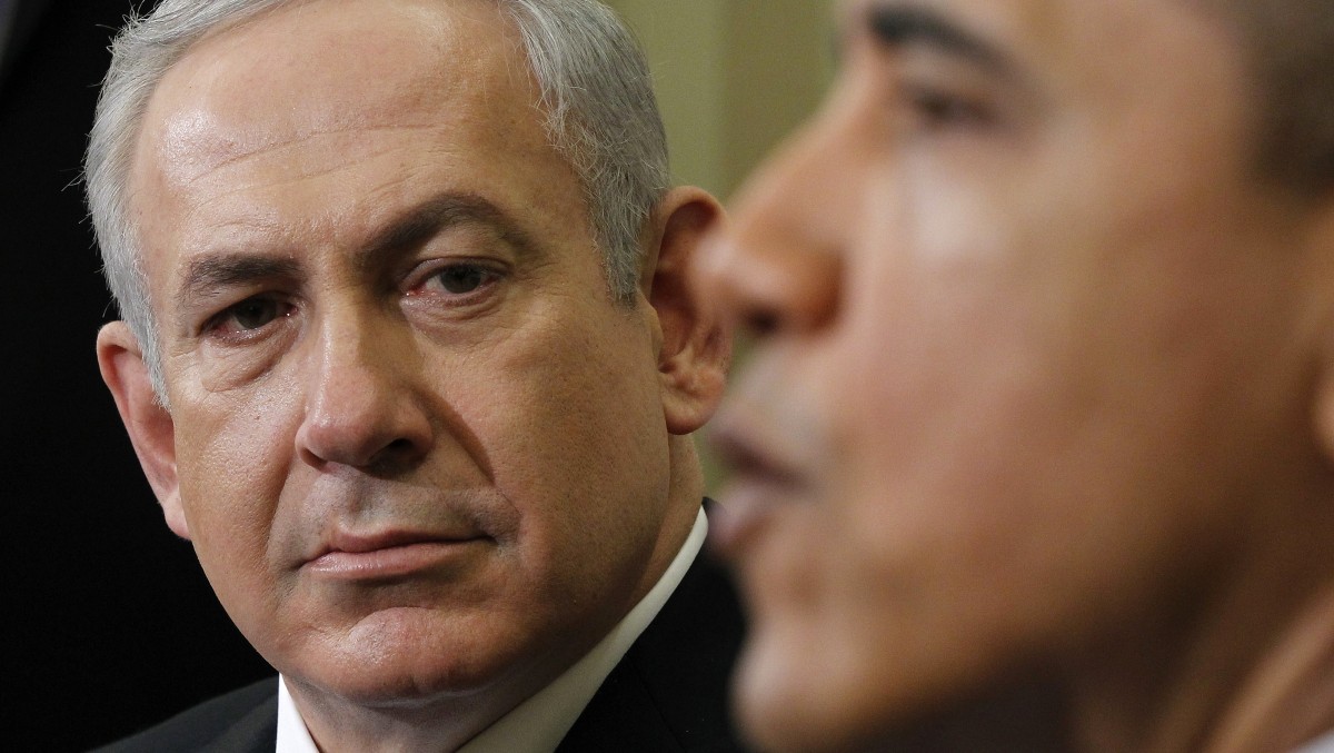 Israeli Prime Minister Benjamin Netanyahu listens as President Barack Obama speaks during their meeting, Monday, March, 5, 2012, in the Oval Office of the White House in Washington. (AP Photo/Pablo Martinez Monsivais)