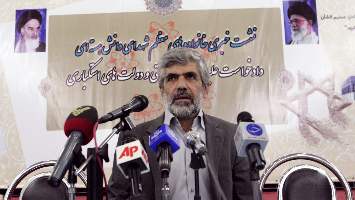 Rahim Ahmadi Roshan, the father of a slain Iranian scientist, speak to the media in Tehran, Iran, Wednesday, Aug. 15, 2012. Families of Iran's slain nuclear scientists have filed a lawsuit against Israel, the U.S. and Britain accusing them of involvement in the assassination of their loved ones. (AP Photo/Vahid Salemi)