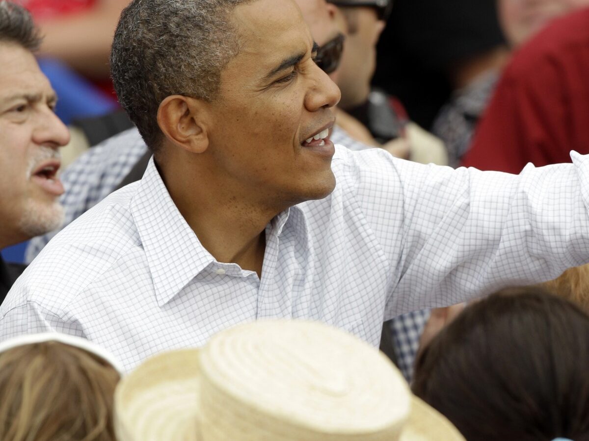 President Barack Obama greets supporters during a campaign stop at the Alliant Energy Amphitheater, Wednesday, Aug. 15, 2012, in Dubuque, Iowa. (AP Photo/Charlie Neibergall)