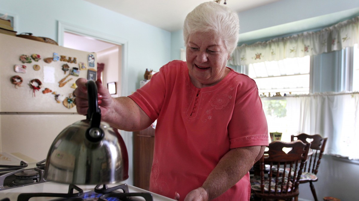 In this photo taken July 26, 2012, Marge Youngs is shown in her home in Toledo, Ohio. As millions of baby boomers flood Social Security with applications for benefits, the program's $2.7 trillion surplus is starting to look small. (AP Photo/Carlos Osorio)