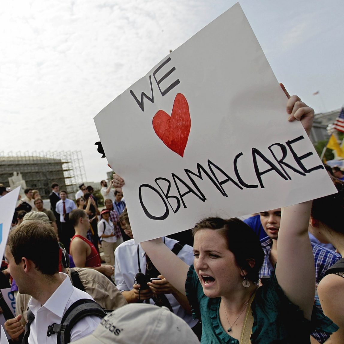 In this June 28, 2012 file photo, supporters of President Barack Obama's health care law celebrate outside the Supreme Court in Washington. (AP Photo/David Goldman, File)