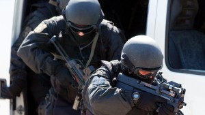 Members of a police anti-terrorism team exercise on Thursday, March 13, 2003. (AP Photo/Thanassis Stavrakis)