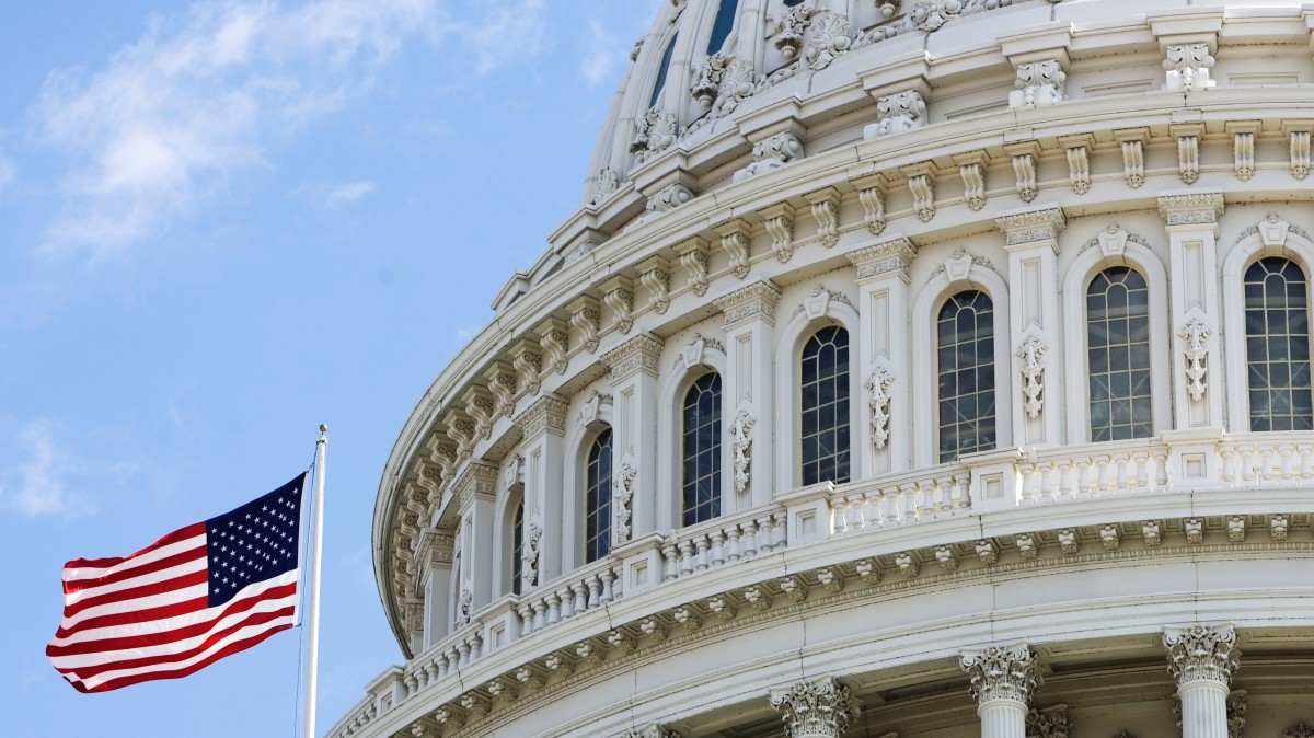 In this Feb. 8, 2009 file photo, the American flag flies at the U.S. Capitol. (AP Photo/Manuel Balce Ceneta, File)