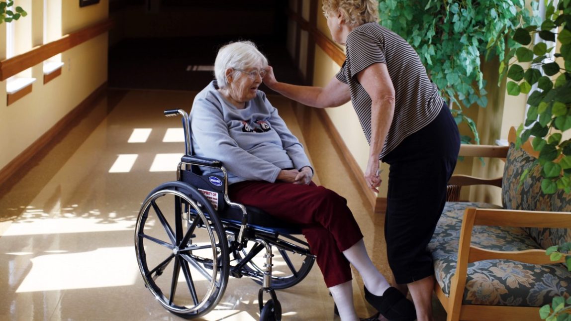 Hazel Eng, 89, lives at The Villages of North Branch nursing home and suffers from advanced Alzheimer's. (AP Photo/Genevieve Ross)