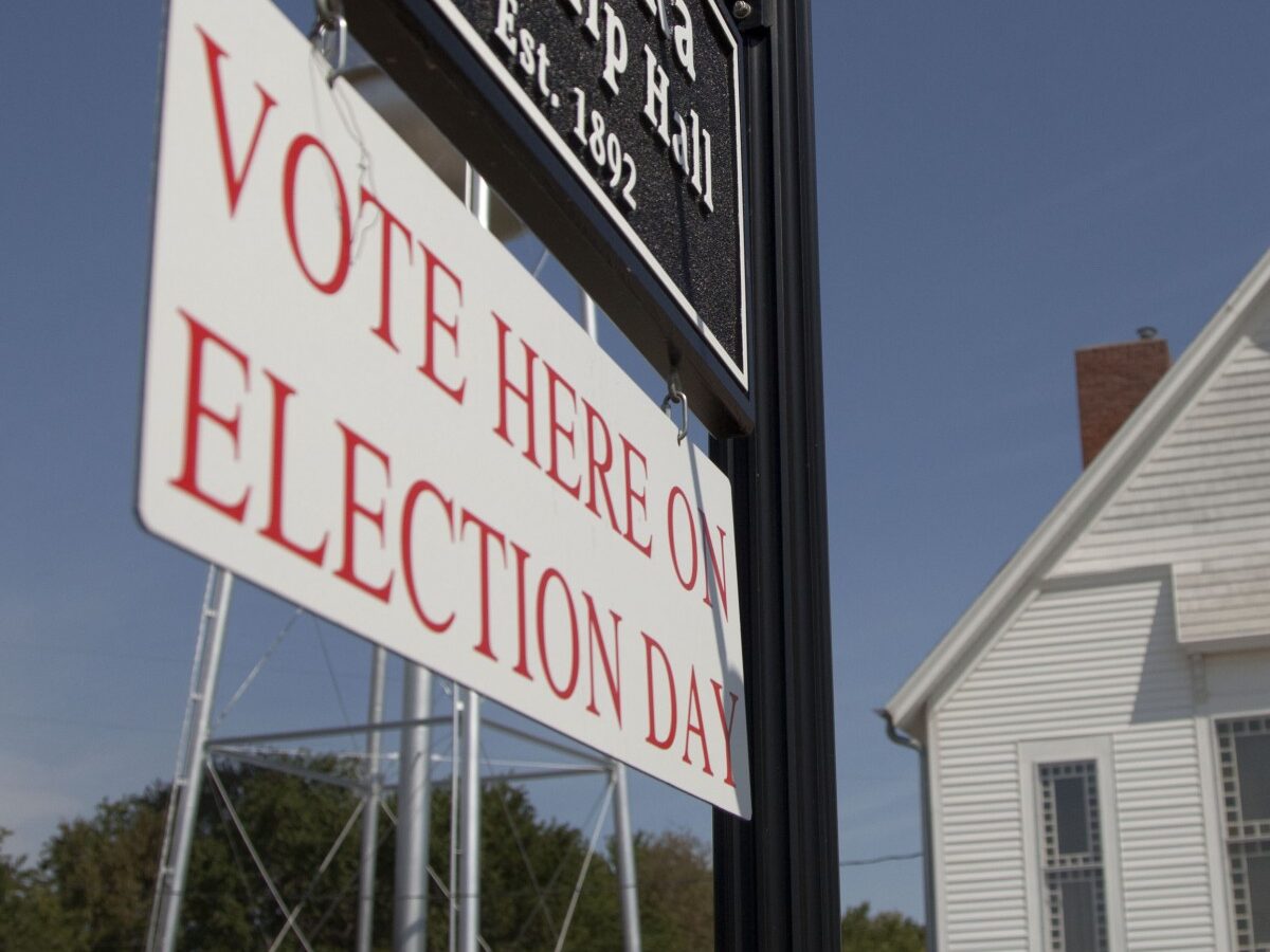 Primary election voters arrive at the Kanwaka Township Hall near Lawrence, Kan., Tuesday, Aug. 7, 2012. (AP Photo/Orlin Wagner)